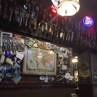 a bar with a lot of items on the wall