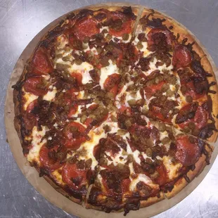 Pepperoni, sausage, bacon pizza