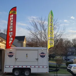 a food truck parked in front of a house
