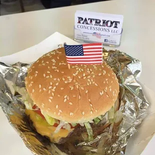 a cheeseburger with an american flag