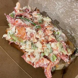 a crab salad in a box