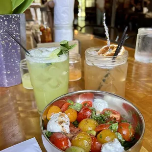Cucumber mocktail and lavender mocktails with some Marfa tomatoes