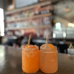 two glasses of orange juice