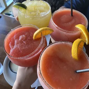 a close up of three margaritas