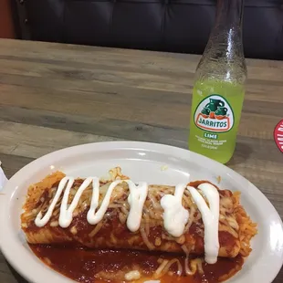 Hot and spicy burrito with a bottle of Jarritos lime.