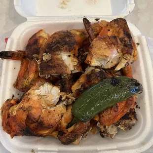 Love the chicken. Thursday special "buy a whole chicken and get an extra half free."  Rice, beans, etc not pictured here.