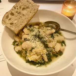Greens &amp; Beans ($12) -- warm gigante beans, kale, chicken sausage, grana padano ($1 extra for side of bread) -- 26 Jan. 2024