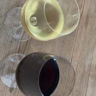 two glasses of wine on a table