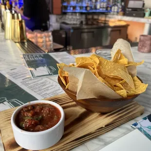 Chips with salsa (a little spice). Provided no charge.