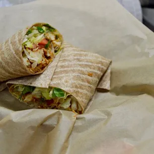 a burrito wrapped in paper