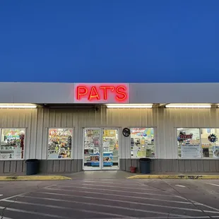 pat's storefront at night