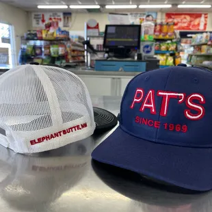 two hats on a counter