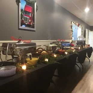 a buffet table with a variety of food items