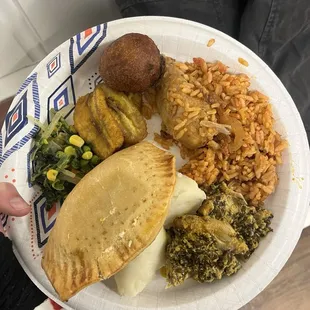 Puff puff, mixed veggies, plantain, egusi soup and pounded yam, and Jollof rice with chicken