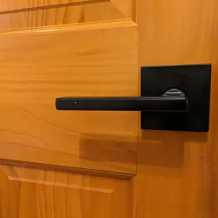 Flat black lever sets for interior doors supplied by Pat&apos;s and installed by Tony