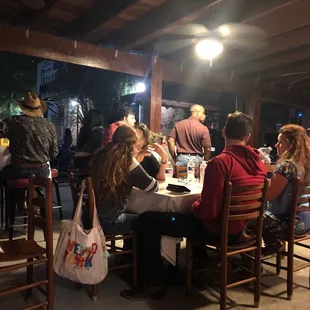 a group of people sitting at a table