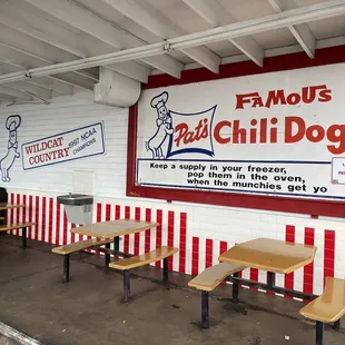 a sign for famous chili dogs