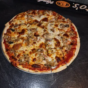 Medium Mushroom Pizza With Extra Cheese.  Was Good.