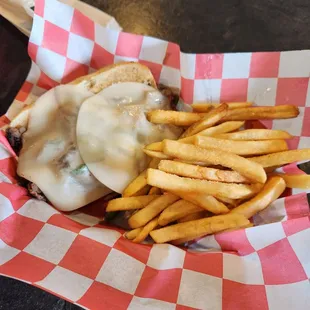 Philly Steak Sandwich And Fries.