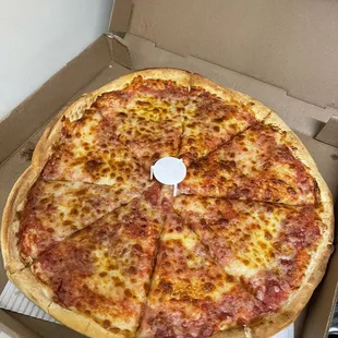 Two delicious pizza pies!