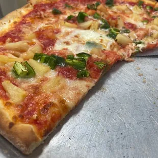 Custom pizza with jalapeño and pineapple.