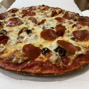 Pepperoni, sausage and black olives