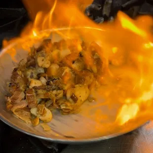 a plate of food on fire