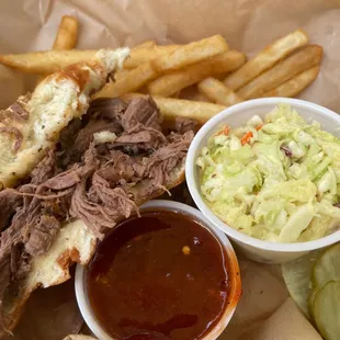 Smoked Brisket sandwich with regular fries.