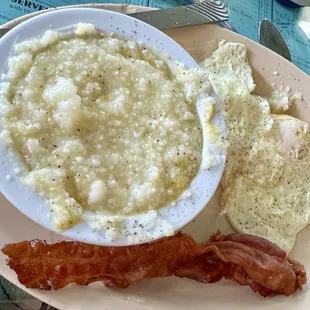 Basic breakfast, eggs, bacon, grits, and toast. I couldn't get a shot before my husband dug in!