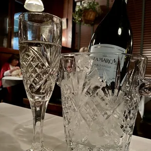 a glass of wine and a bottle of wine