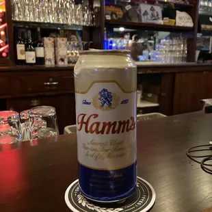 a can of hammer's beer on a coaster