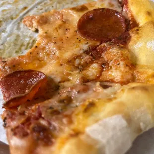 a slice of pepperoni pizza