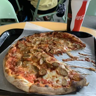 Sausage pizza. The best anywhere! One happy man!