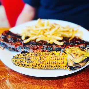 Ribs, fried, and corn.