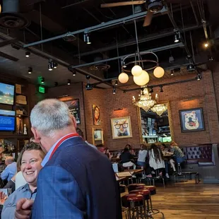 a group of people in a restaurant