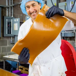 Si holding up a beautiful slab of Caramel!