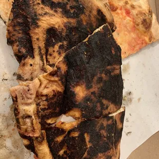 Pizza burnt black and inedible!  It all went into the trash. Do not order delivery!