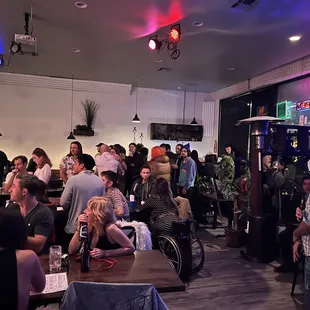 a large group of people in a restaurant