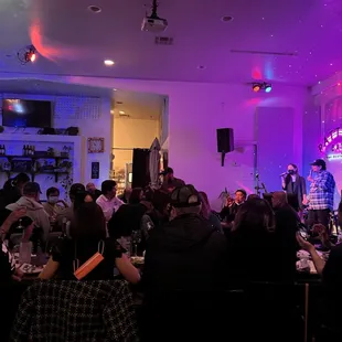 a group of people sitting at a table