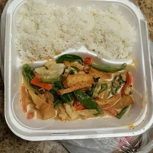 red curry with tofu on to go box. 1st time eating at pattaya, very tasty food. they are close to work.