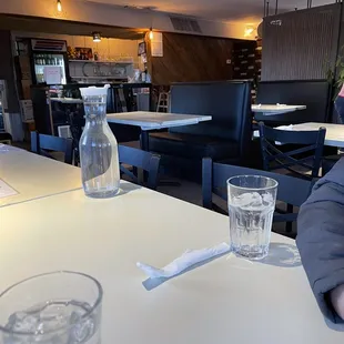 a man sitting at a table in a restaurant