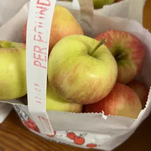 a basket of apples on a table
