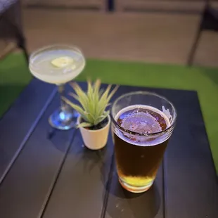 two glasses of beer on a table