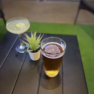 two glasses of beer on a table