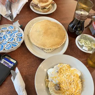 Breakfast bowl, blueberry pancakes, banger sandwhich