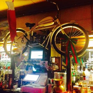 Bike up in the air above bar