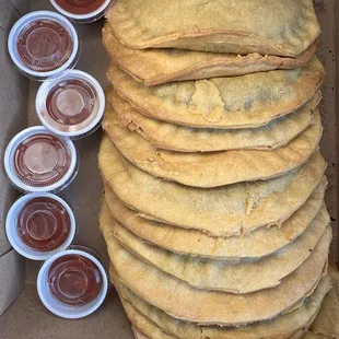 Dozen patties with hot sauce