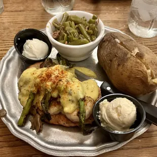 Chicken Oscar with green beans and a baked potato