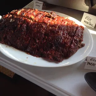 a meat loaf on a white plate