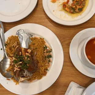 plates of food on a wooden table
